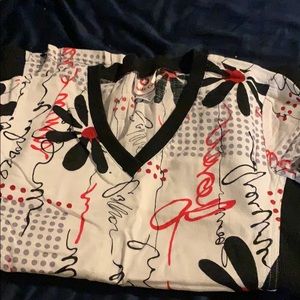 Scrub top by white cross